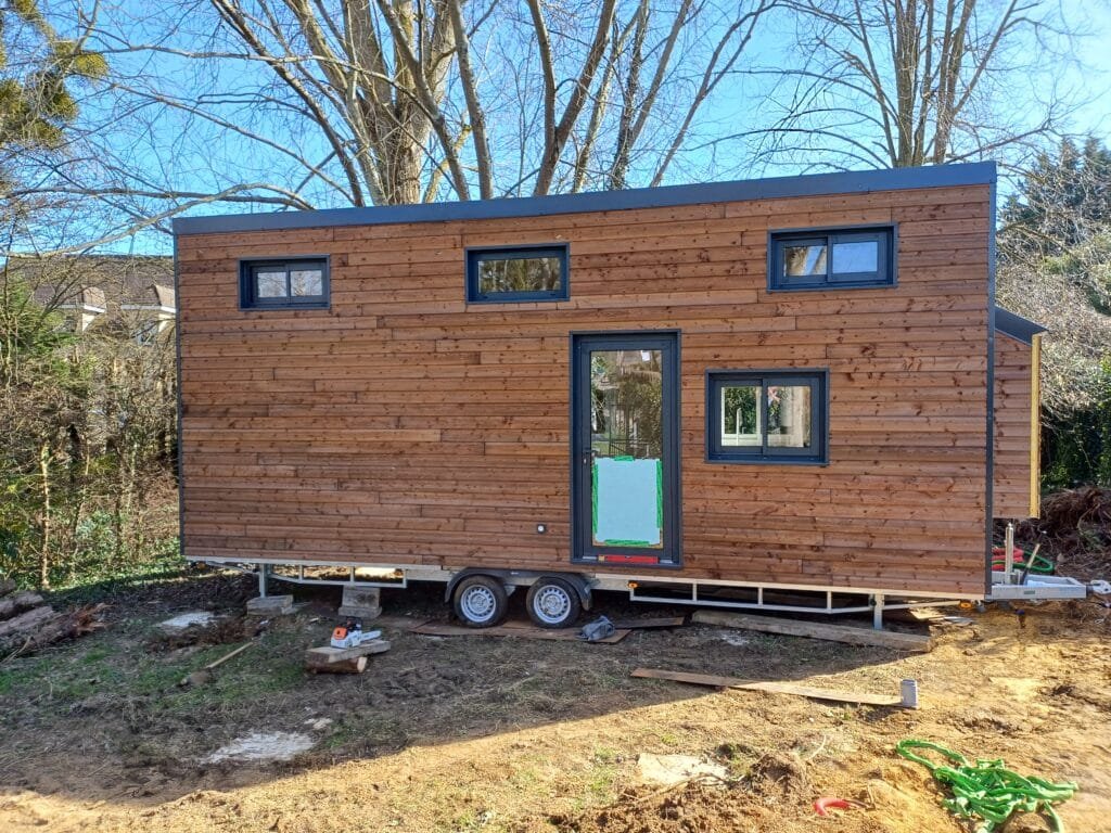 Tiny-malisme - Mini-Maison Écologique : Vivre Durablement en Harmonie avec la Nature - Featured Image 1